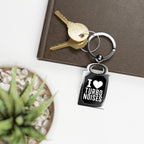 Silver keyring charm with black 'I ♥ TURBO NOISES' tag and attached key