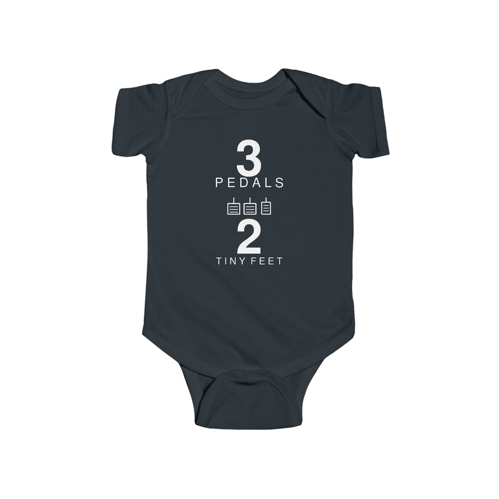 Black baby bodysuit with Three Pedals graphic on front
