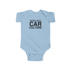 Light blue baby bodysuit with short sleeves and front “Born Into Car Culture” graphic