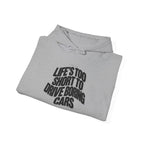 Light gray pullover hoodie with 'Drive boring cars' graphic on the front.