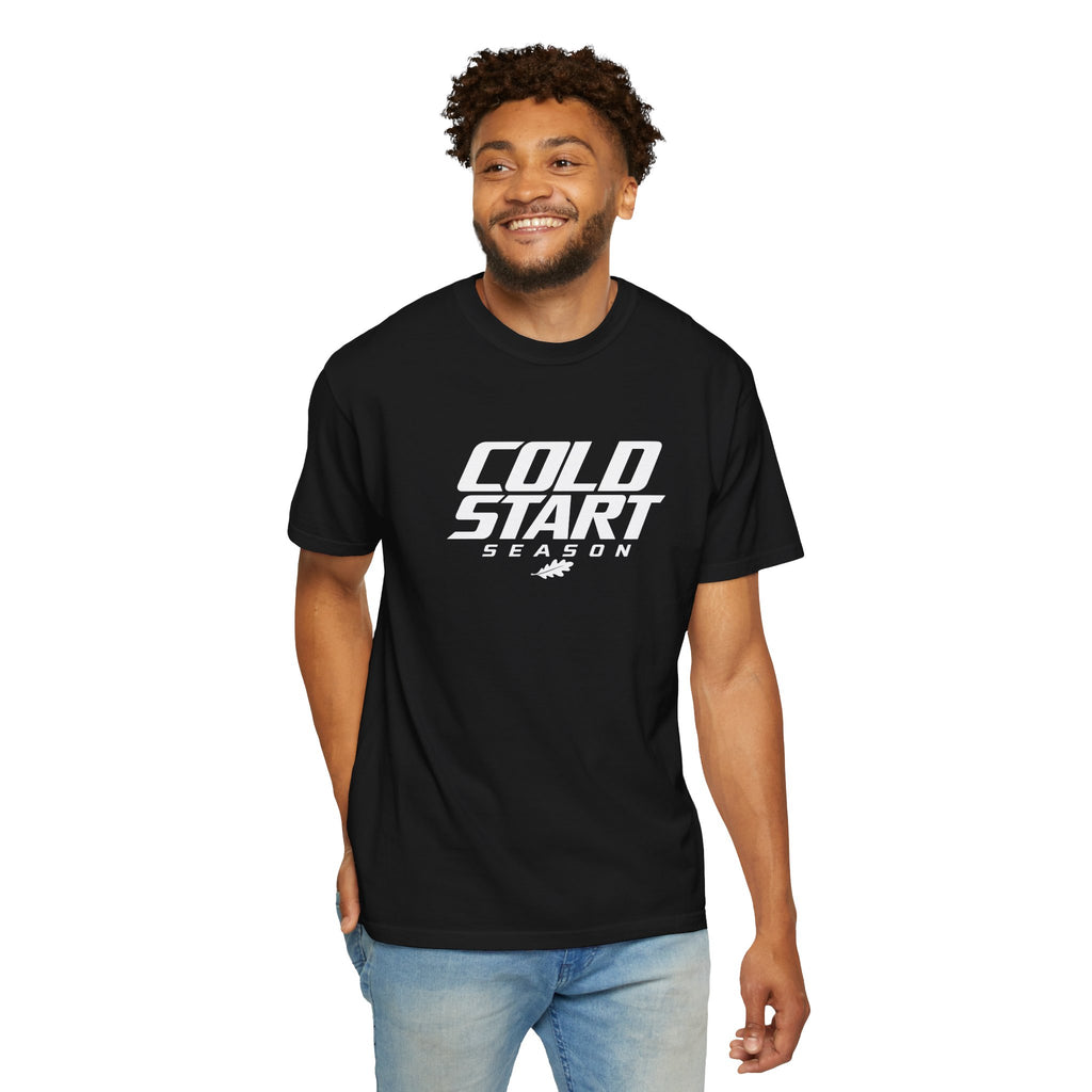 Black graphic T-shirt worn by model with "COLD START SEASON" logo on front