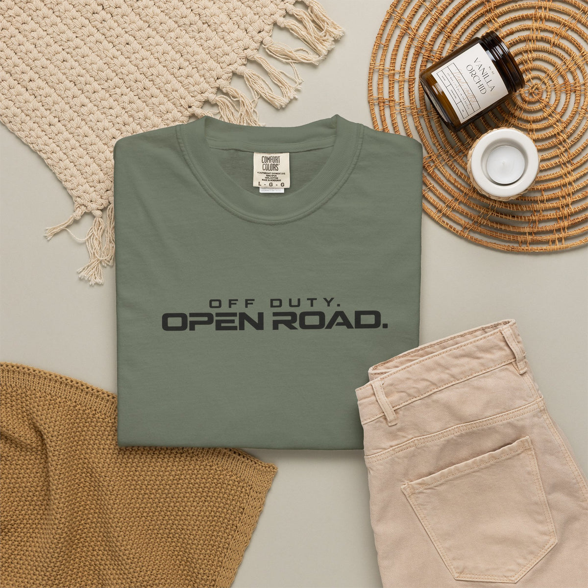 Moss green crewneck T-shirt with 'Off Duty Open Road' logo on chest