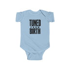 Light blue baby bodysuit with short sleeves and “TUNED FROM BIRTH” front graphic