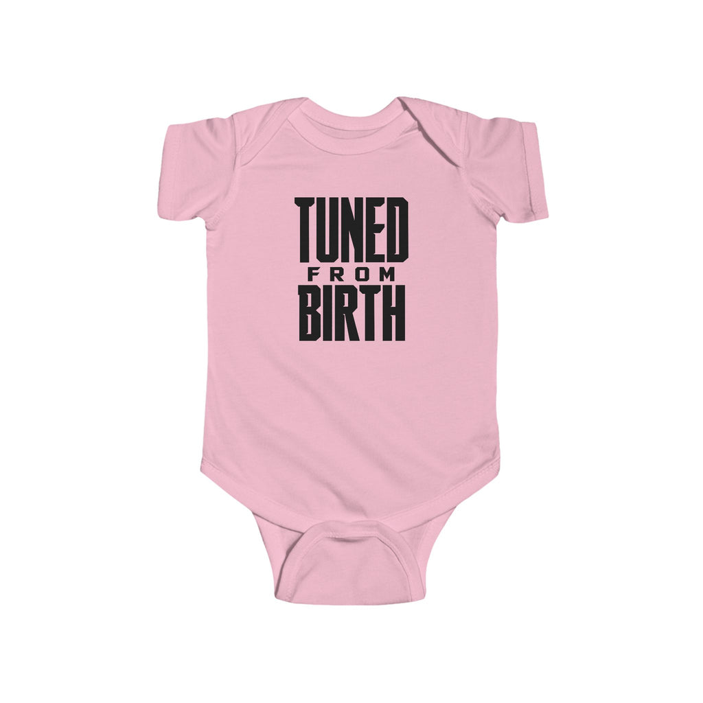 Pink baby bodysuit with short sleeves and “TUNED FROM BIRTH” front graphic