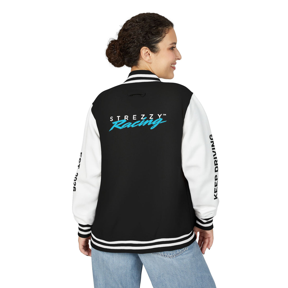 Racing varsity jacket back view, black body with white sleeves; striped ribbed collar and hem