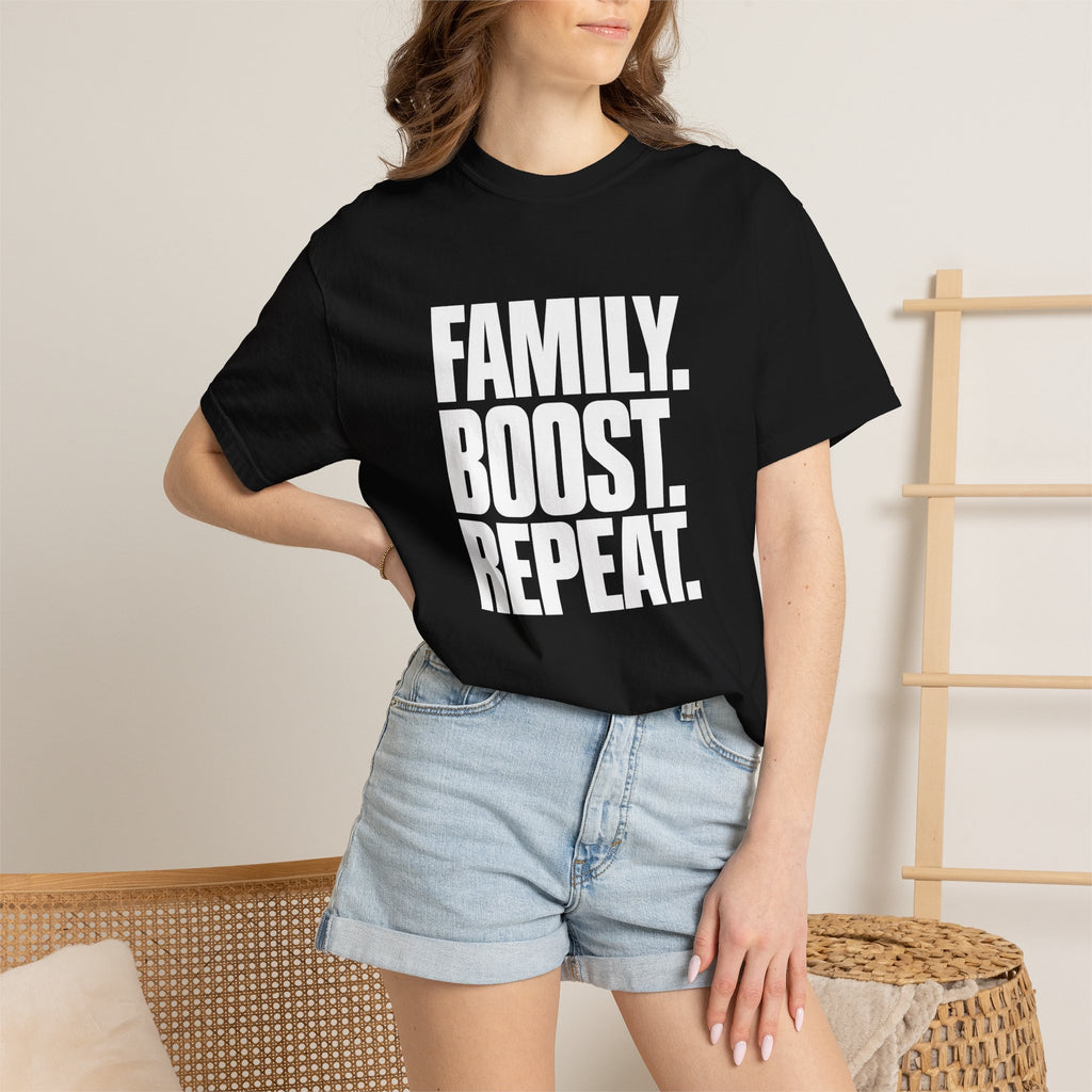 Black graphic slogan T-shirt worn by a woman, chest text visible