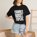 Black graphic slogan T-shirt worn by a woman, chest text visible