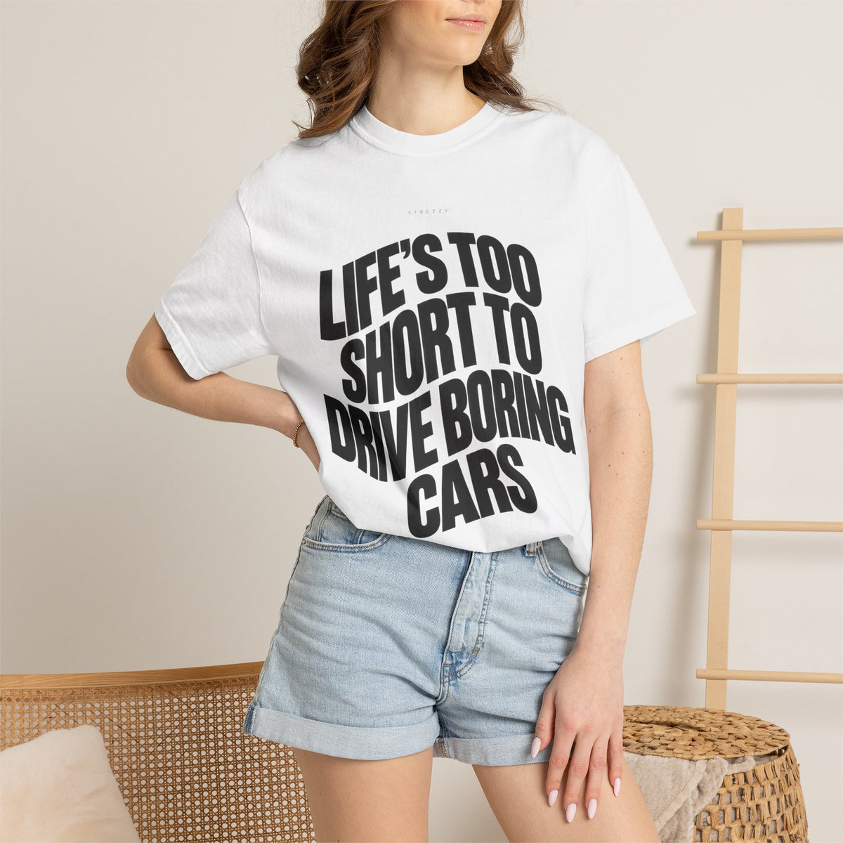 White crewneck T-shirt with bold black quote graphic