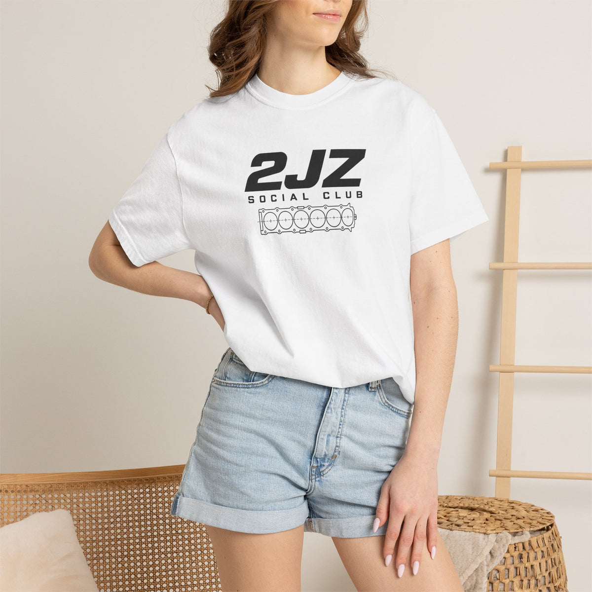 White crew-neck T-shirt with 2JZ Social Club chest graphic on model