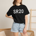 Black SR20 graphic T-shirt on model, crew neck and short sleeves