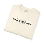 Ivory crew-neck T-shirt with “Daily Driver” logo print on chest.