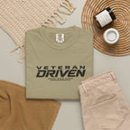 Olive green crew-neck T-shirt with front "VETERAN DRIVEN" graphic