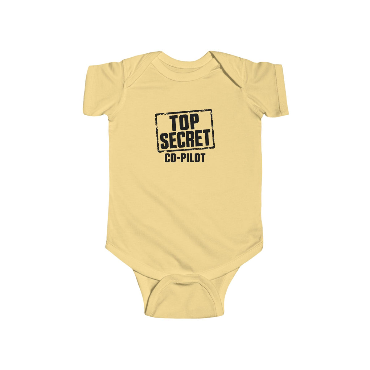 Butter yellow baby bodysuit with short sleeves and “Top Secret Co-pilot” chest graphic