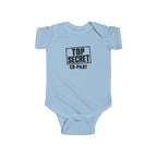 Light blue baby bodysuit with short sleeves and “Top Secret Co-pilot” chest graphic