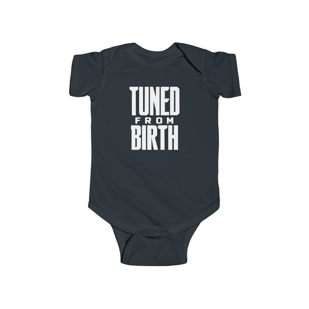 Black baby bodysuit with short sleeves and “TUNED FROM BIRTH” front graphic