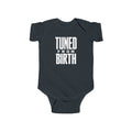 Black baby bodysuit with short sleeves and “TUNED FROM BIRTH” front graphic