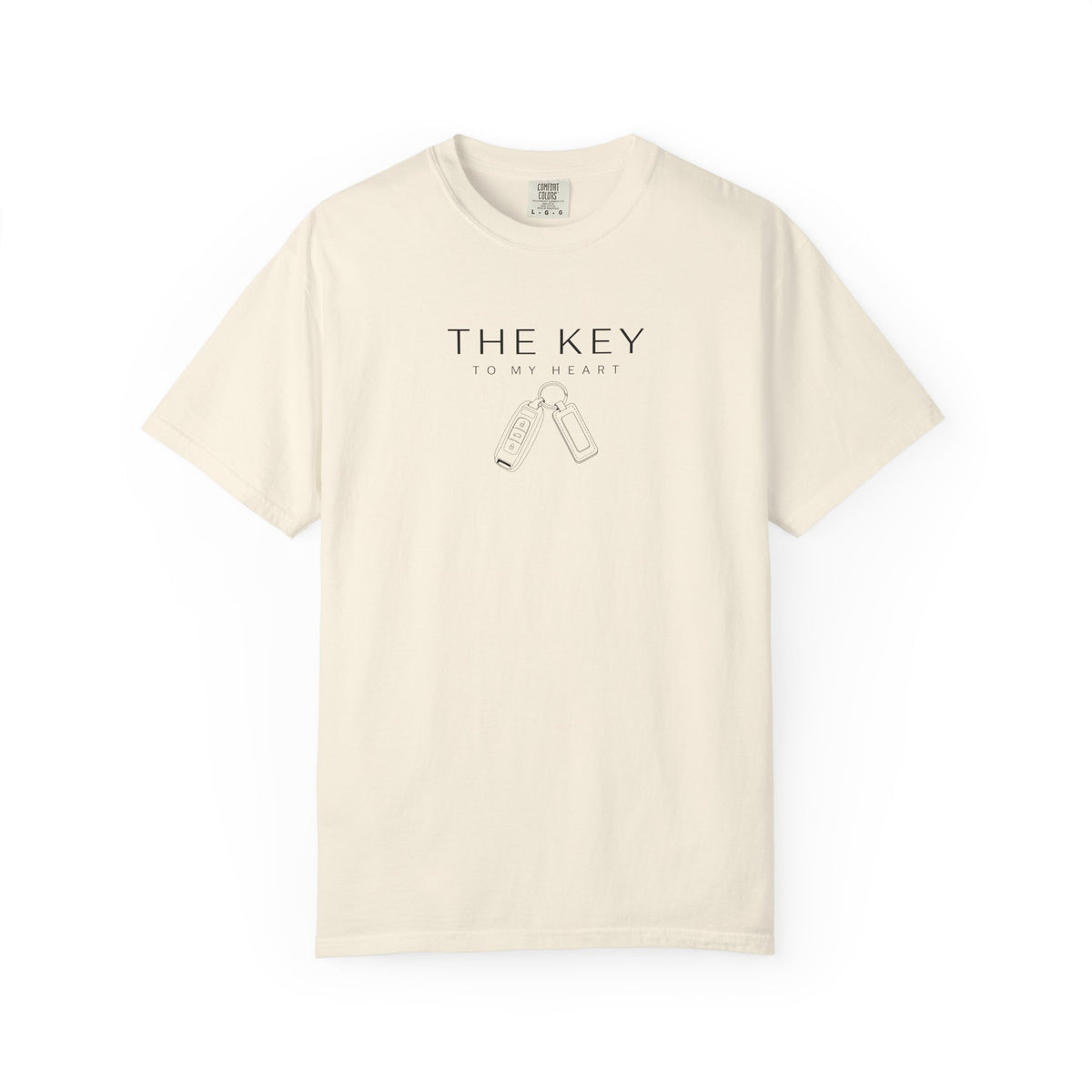 Ivory crew-neck T-shirt with 'THE KEY' text and key graphic above 'TO MY HEART'.