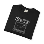 Black crew-neck T-shirt laid flat with large front laptop graphic and text.