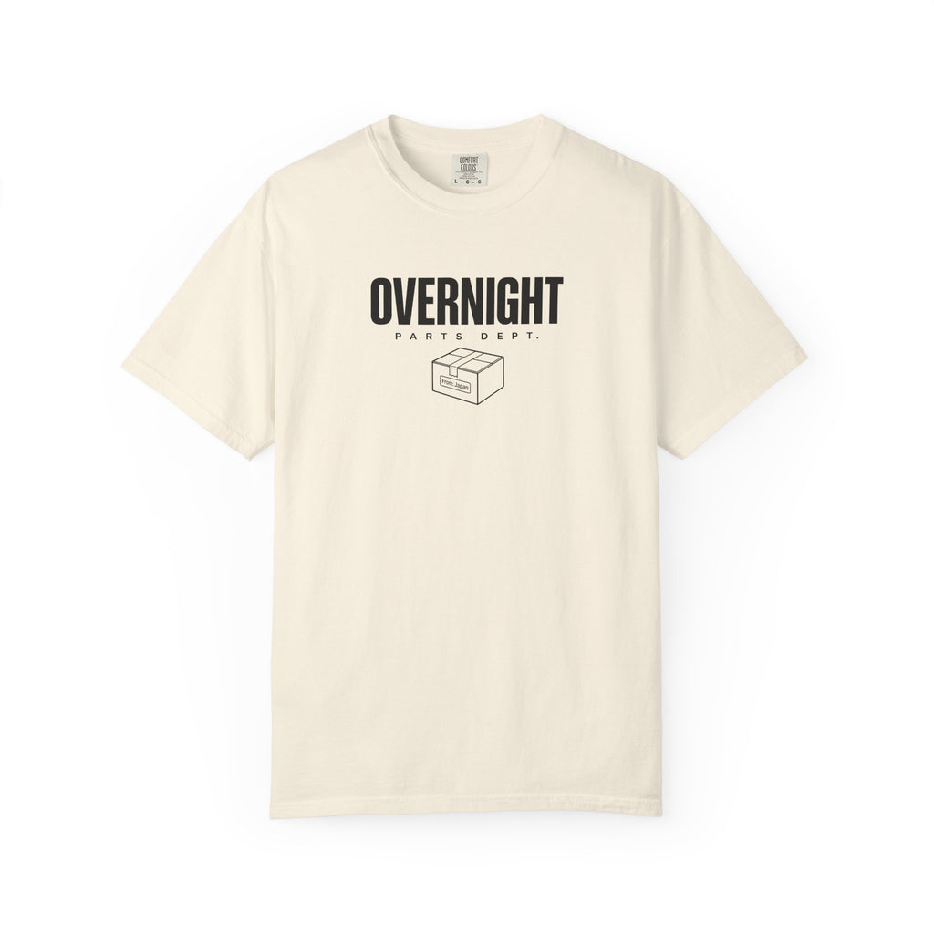 Ivory crewneck T-shirt with OVERNIGHT parts dept. box graphic on the chest